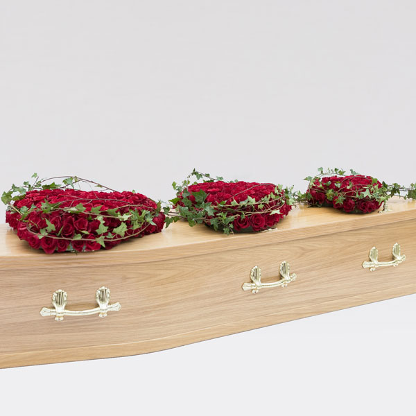 rose coffin and casket flower tribute
