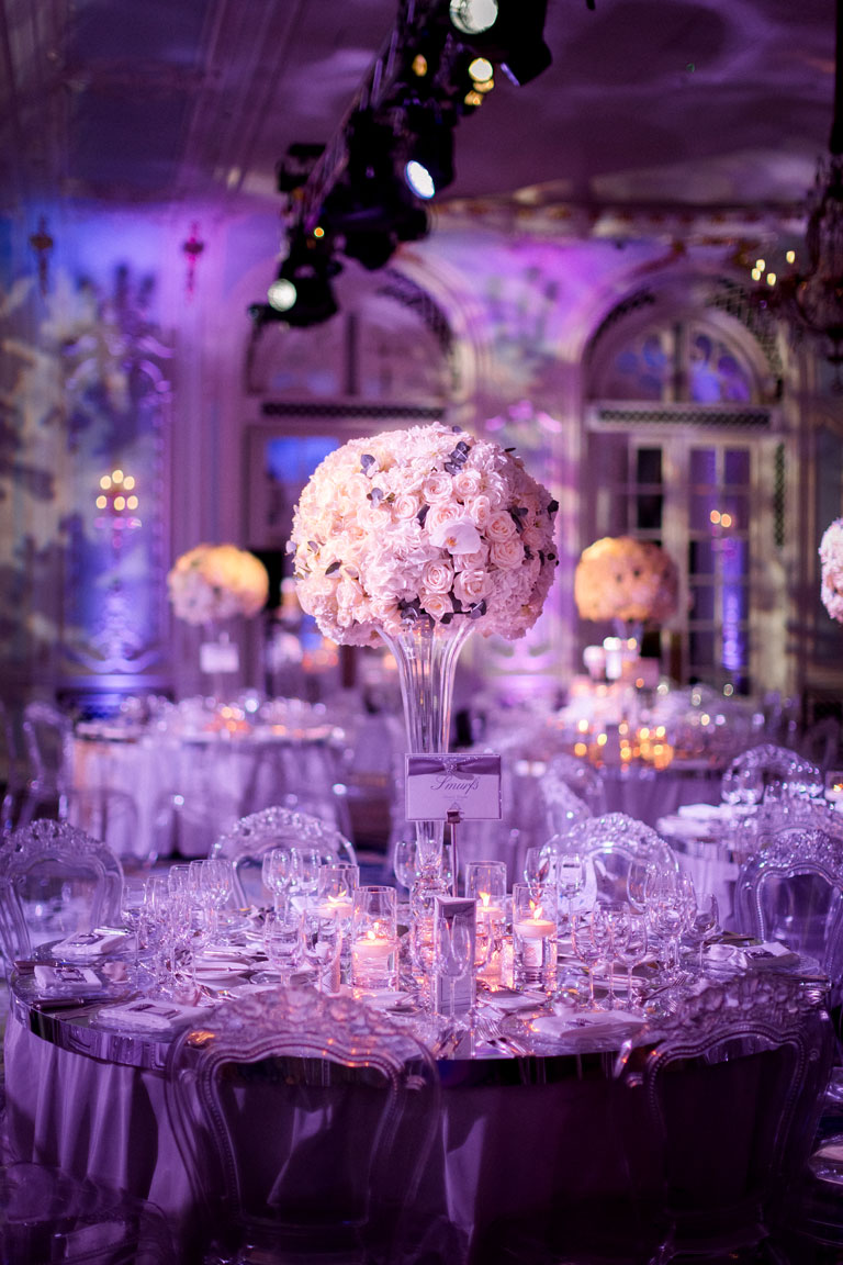huge domes of white hydrangeas, roses and orchids with a smattering of eucalyptus on a table at The Savoy by Amie Bone Flowers