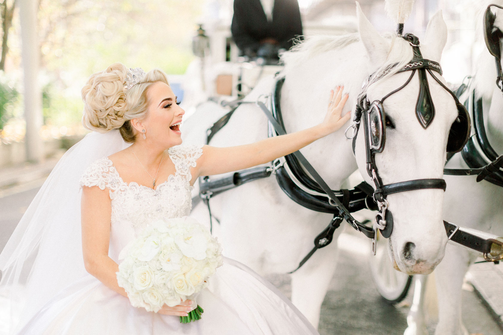Savoy bride and horse with her bridal bouquet